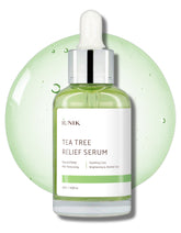 IUNIK Tea Tree Relief Serum bottle pour shows lightweight hydration for acne-prone skin.