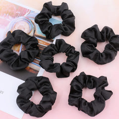 IVARYSS satin scrunchies black 16-pack; elastic and secure without snagging.