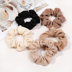 Ivyu hair scrunchies stretch elastic band in action for secure hold.