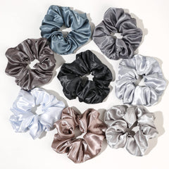 Ivyu satin scrunchies 8-pack on hair demonstrate secure hold with gentle pull.