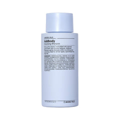 J Beverly Hills Blue Addbody volumizing shampoo bottle ready to moisturize and lift fine hair