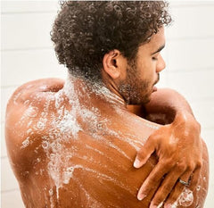 Jack Black All-Over Wash being applied to hair to condition and soften strands with panthenol