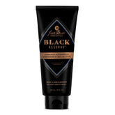 Jack Black Black Reserve bottle closeup shows dual-action cleansing for skin and hair