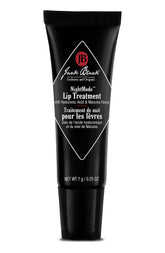 Jack Black NightMode Lip Treatment tube close-up showing hydrating formula for overnight lips