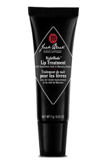 Jack Black NightMode Lip Treatment tube close-up showing hydrating formula for overnight lips