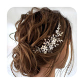 Jakawin bride hair comb with pearl flowers in silver adds elegant wedding styling.