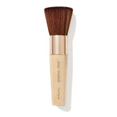 jane iredale The Handi Brush with rose-gold handle supports precise powder application.