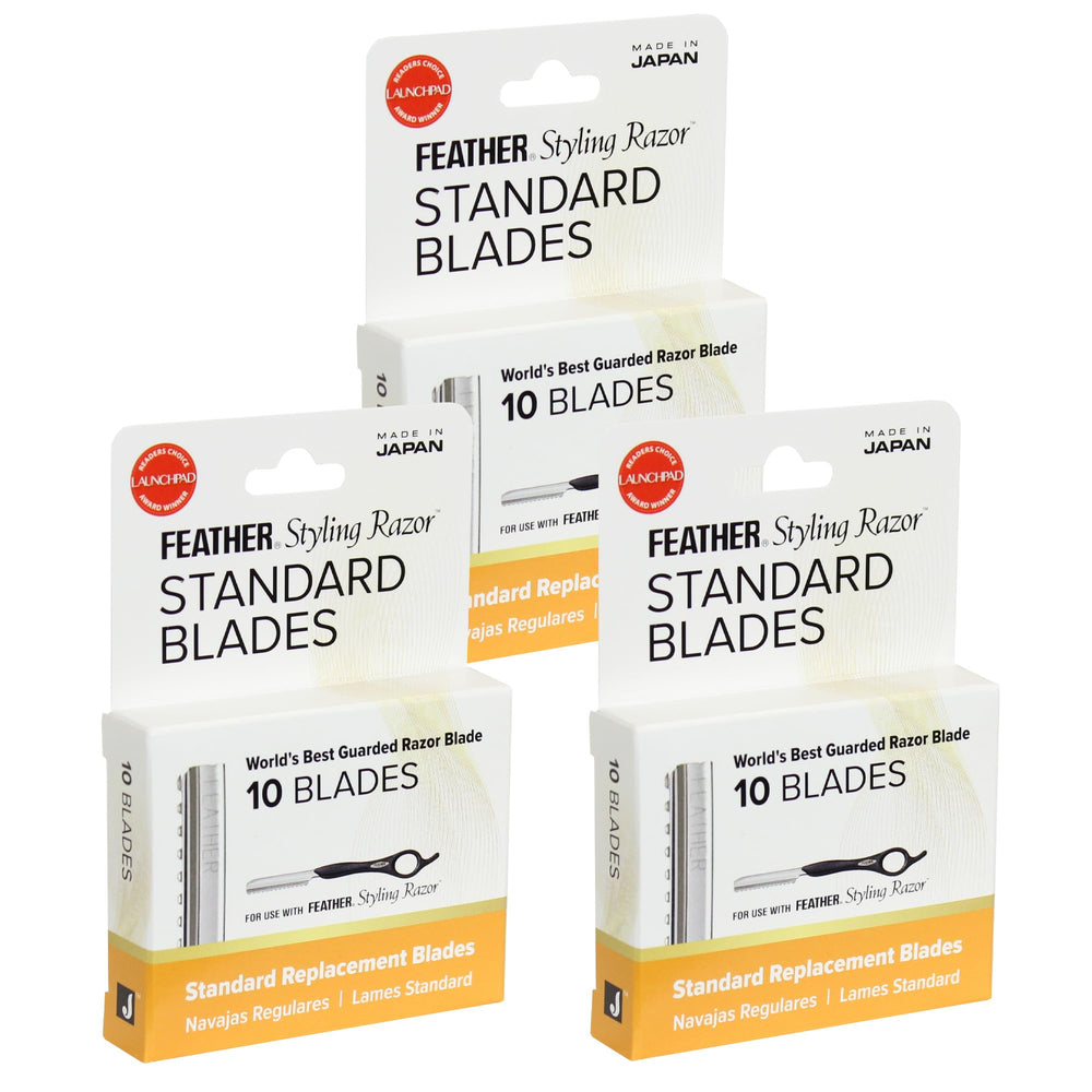Jatai Feather styling razor blade close-up with a sharp edge for precise cuts.