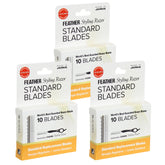Jatai Feather styling razor blade close-up with a sharp edge for precise cuts.