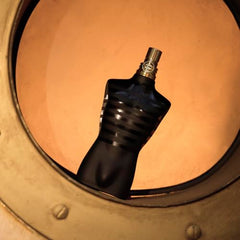 Jean Paul Gaultier Le Male Le Parfum cap closeup suggests premium presentation and refinement.