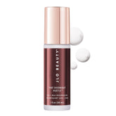 JLO Beauty exfoliant jar closeup showing nightly resurfacing texture.