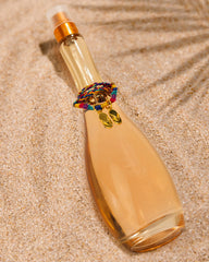 Jennifer Lopez Miami Glow cap closeup highlights premium packaging and refined style.