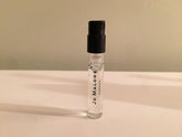 Jo Malone English Pear and Freesia bottle close-up for refined everyday fragrance.