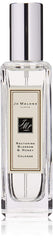 Jo Malone Nectarine Blossom & Honey bottle on a vanity for daytime elegance.