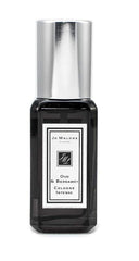 Jo Malone Oud & Bergamot Intense travel bottle closeup, ideal for on-the-go refined fragrance for evenings.