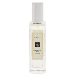 Jo Malone Pomegranate Noir cap close-up, suggests easy application and refined evening scent.