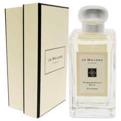 Jo Malone Pomegranate Noir cap-top highlighting premium packaging and easy handling