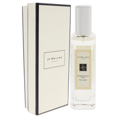 Jo Malone Pomegranate Noir spray application, convenient travel-size bottle for on-the-go refreshment.