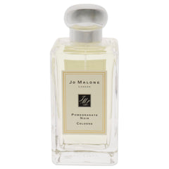 Jo Malone Pomegranate Noir spray demonstrates precise application for occasion-ready scent