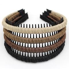 JOBAND plastic headband with non-slip teeth keeps hair secure during workouts.