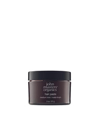 John Masters Organics Hair Paste matte finish packaging for easy on-the-go styling.
