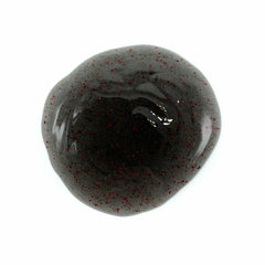 Johnny Slicks Body Wash exfoliating beads closeup highlights gentle scrubbing for smoother skin.