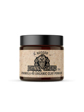 Johnny Slicks Formula 49 clay pomade bottle closeup showing firm hold and matte finish