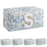JOVAKIT Alphabet Makeup Bag in blue floral design ideal for daily cosmetics.