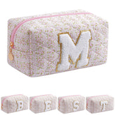 JOVAKIT Alphabet makeup bag pink floral close-up organized for travel use.