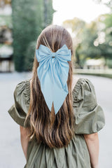 JOYOYO hair clip blue long bow on ponytail demonstrates effortless day-to-night styling.