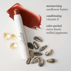 Julep packaging and balm tube highlight clean vegan formulation for daily lip care.