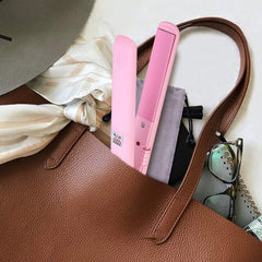 Juroicessry 2-in-1 straightener-curler showcases compact dual functionality for versatile styles.