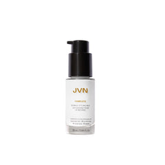 JVN Complete Blowout Styling Milk bottle front, travel-size silicone-free heat protectant for on-the-go styling.