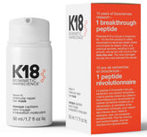 K18 full-size leave-in molecular mask bottle promising stronger, healthier hair.