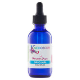 KALEIDOSCOPE MIRACLE DROPS bottle pouring, delivering quick-absorbing scalp oil for refreshed, nourished hair.