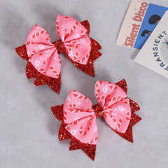 KCHIES Glitter Pink Candy Cane Bow Clip side view highlights durable PU leather shape.