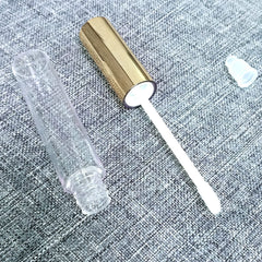 KEAIYYJ refillable lip gloss container with wand, travel-friendly and perfect for custom blends.