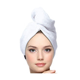 Keepoz hair towel wrap texture close-up highlighting plush 100% cotton for quick moisture absorption.