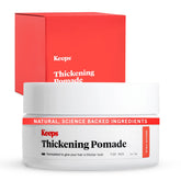 Keeps Matte Thickening Pomade tube front for on-the-go styling.
