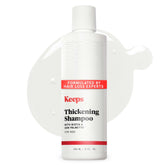 Keeps Thickening Shampoo bottle front promoting fuller-looking hair.