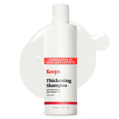 Keeps Thickening Shampoo bottle front promoting fuller-looking hair.