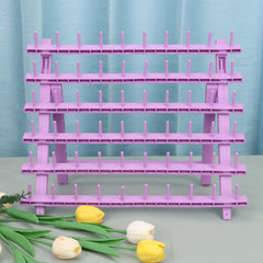 Kelukeya braid rack with 60 spools organized for quick selection during sessions