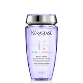 KÉRASTASE Blond Absolu hydrating shampoo bottle shows luminous blonde care benefits.