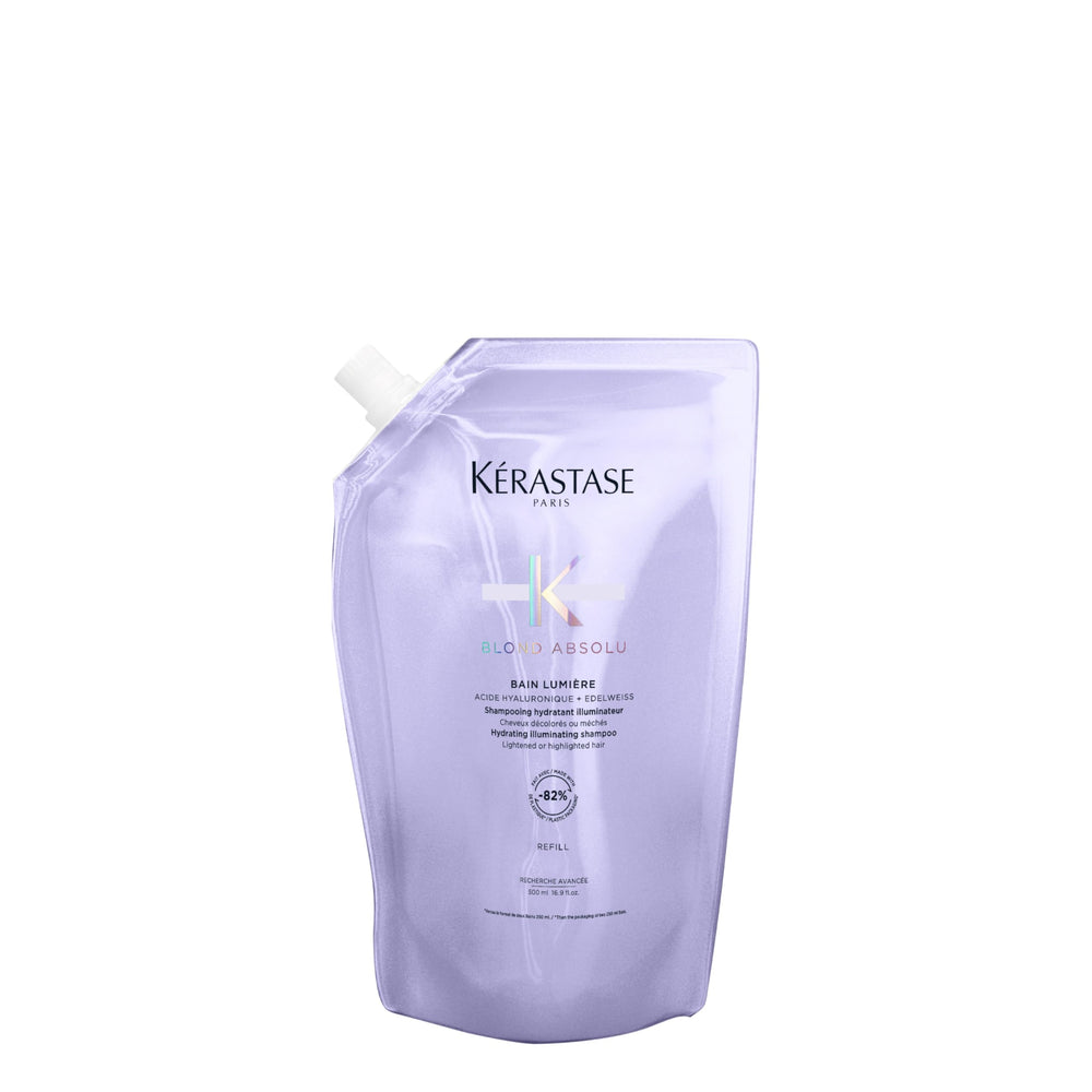 KÉRASTASE Blond Absolu Lumière shampoo bottle highlights hydrating formula for luminous hair.