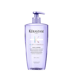 Kerastase Blond Absolu Lumière shampoo bottle shows hydrating, luminous formula for highlighted hair.