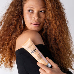 Close-up of Creme de Jour texture showing ultra-lightweight formula