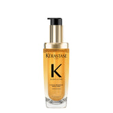 Kérastase Elixir Ultime oil pour showing nourishing shine for smooth hair.