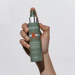 Kérastase Genesis Homme Spray De Force applied to wet hair to lift roots