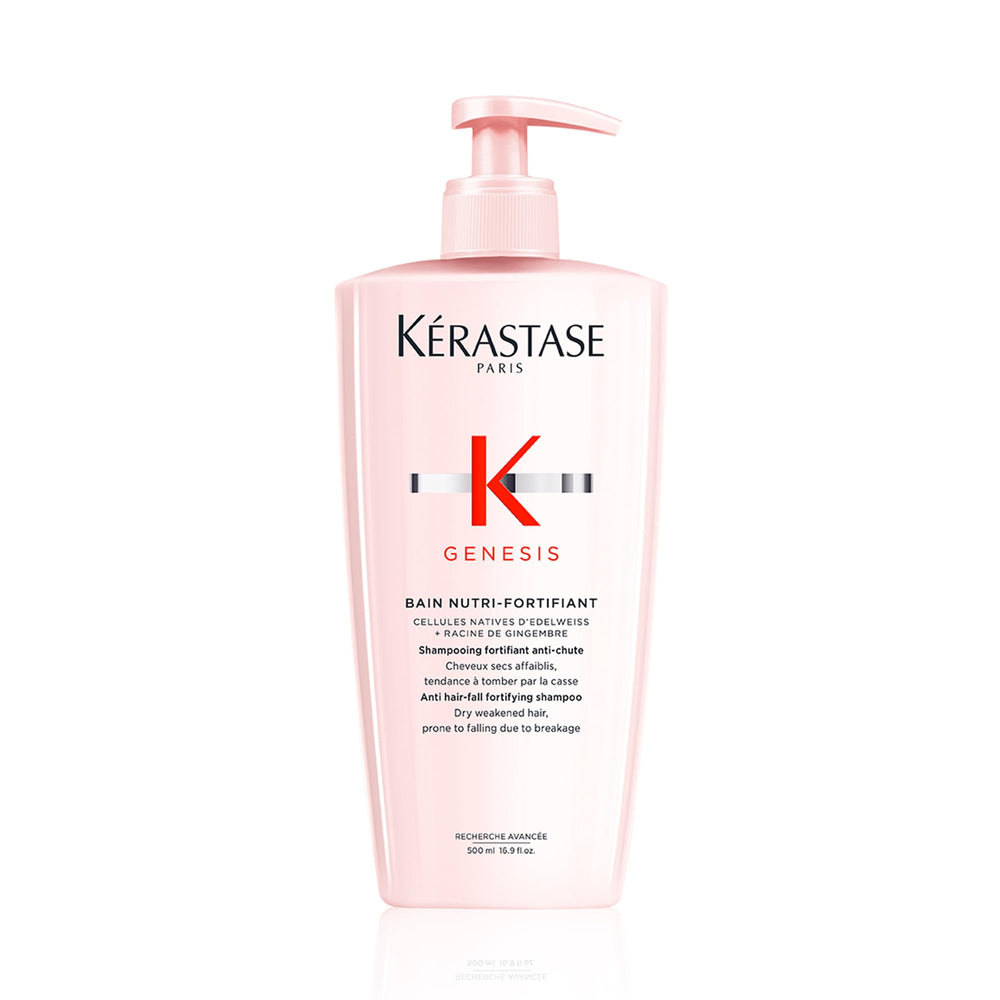 Kérastase Genesis Strengthening Shampoo bottle pours to cleanse scalp and fortify hair