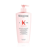 Kérastase Genesis Strengthening Shampoo bottle pours to cleanse scalp and fortify hair